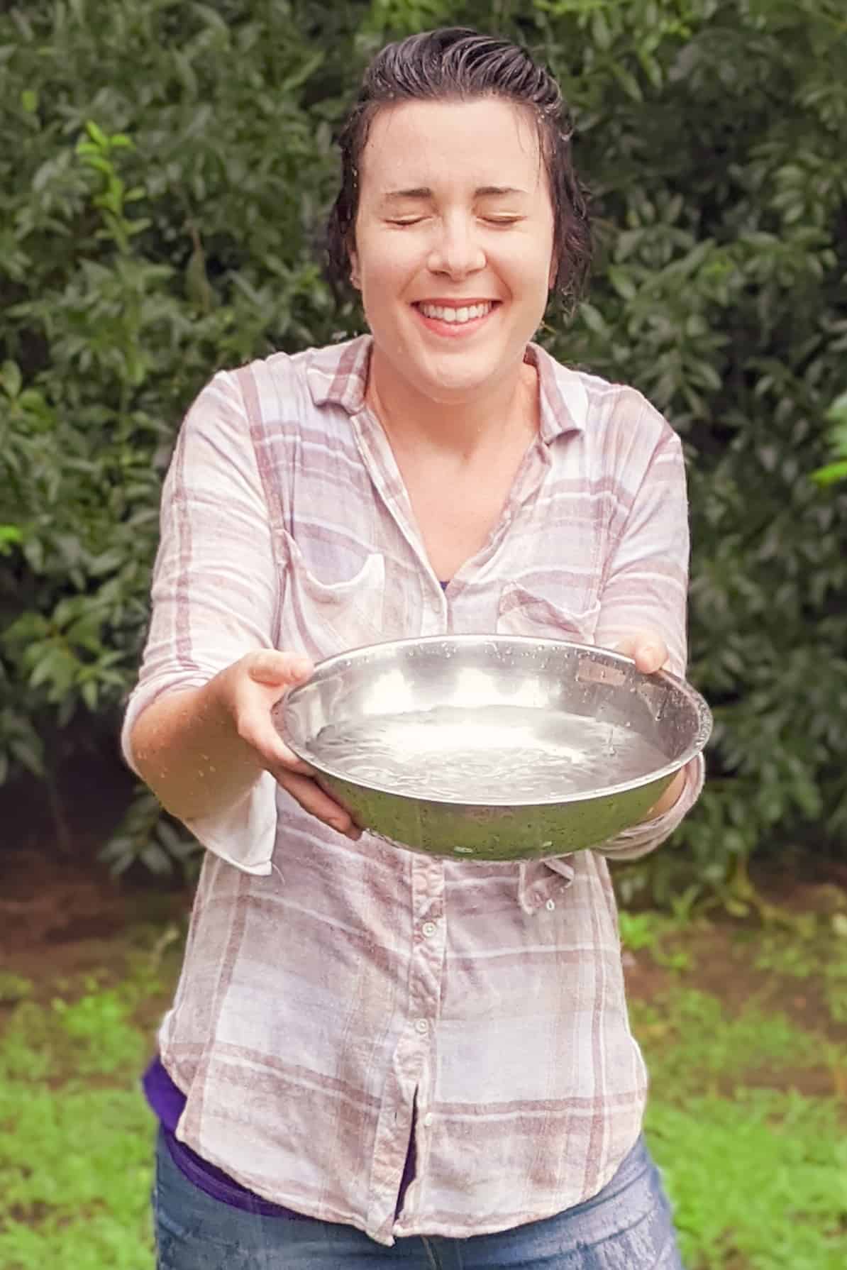 Maker Jennifer Evarts collects rain water